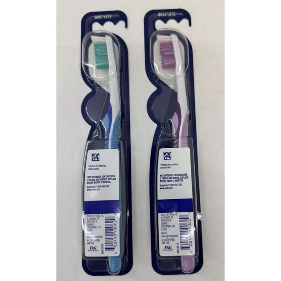 Lot of 2 ORAL B Vivid Whitening Toothbrush Medium Purple Blue New Sealed - Picture 2 of 6